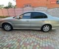 Серый Шевроле Эванда, объемом двигателя 2 л и пробегом 219 тыс. км за 2700 $, фото 1 на Automoto.ua