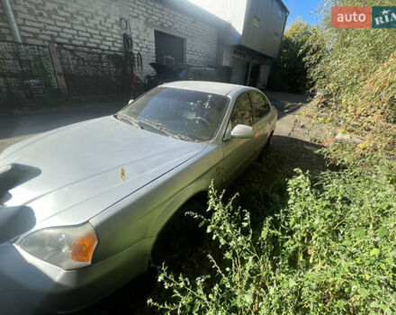 Серый Шевроле Эванда, объемом двигателя 2 л и пробегом 300 тыс. км за 1300 $, фото 2 на Automoto.ua