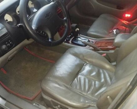 Серый Шевроле Эванда, объемом двигателя 2 л и пробегом 234 тыс. км за 2900 $, фото 2 на Automoto.ua