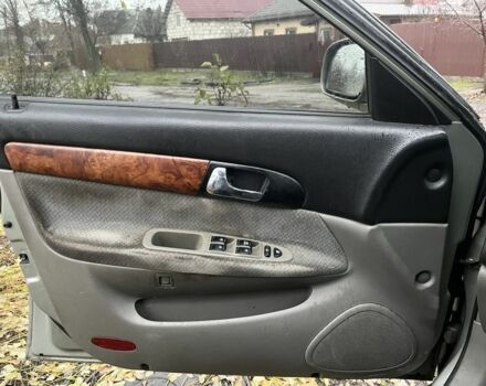 Сірий Шевроле Еванда, об'ємом двигуна 2 л та пробігом 300 тис. км за 3200 $, фото 14 на Automoto.ua