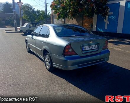 Серый Шевроле Эванда, объемом двигателя 2 л и пробегом 288 тыс. км за 3400 $, фото 4 на Automoto.ua