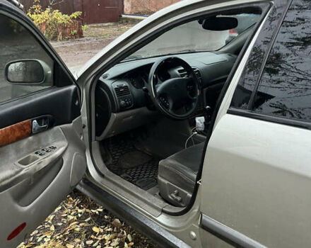 Серый Шевроле Эванда, объемом двигателя 2 л и пробегом 300 тыс. км за 3200 $, фото 11 на Automoto.ua