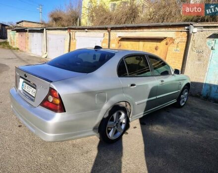 Сірий Шевроле Еванда, об'ємом двигуна 2 л та пробігом 330 тис. км за 3999 $, фото 6 на Automoto.ua