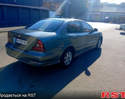 Серый Шевроле Эванда, объемом двигателя 2 л и пробегом 288 тыс. км за 3400 $, фото 1 на Automoto.ua