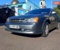 Сірий Шевроле Еванда, об'ємом двигуна 2 л та пробігом 288 тис. км за 3400 $, фото 9 на Automoto.ua