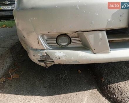 Серый Шевроле Эванда, объемом двигателя 2 л и пробегом 215 тыс. км за 2900 $, фото 2 на Automoto.ua