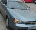 Сірий Шевроле Еванда, об'ємом двигуна 2 л та пробігом 270 тис. км за 4350 $, фото 1 на Automoto.ua