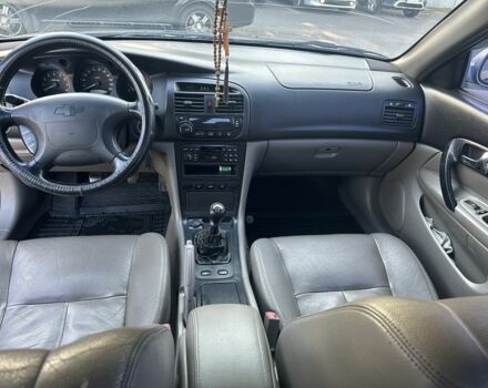 Серый Шевроле Эванда, объемом двигателя 2 л и пробегом 255 тыс. км за 2770 $, фото 14 на Automoto.ua