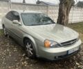 Сірий Шевроле Еванда, об'ємом двигуна 2 л та пробігом 300 тис. км за 3200 $, фото 1 на Automoto.ua