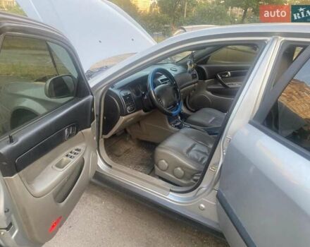 Сірий Шевроле Еванда, об'ємом двигуна 2 л та пробігом 172 тис. км за 4500 $, фото 6 на Automoto.ua