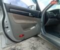 Сірий Шевроле Еванда, об'ємом двигуна 2 л та пробігом 295 тис. км за 3500 $, фото 9 на Automoto.ua