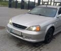 Серый Шевроле Эванда, объемом двигателя 2 л и пробегом 292 тыс. км за 3600 $, фото 1 на Automoto.ua