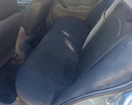 Серый Шевроле Эванда, объемом двигателя 2 л и пробегом 250 тыс. км за 2800 $, фото 2 на Automoto.ua