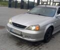 Серый Шевроле Эванда, объемом двигателя 2 л и пробегом 292 тыс. км за 3800 $, фото 1 на Automoto.ua