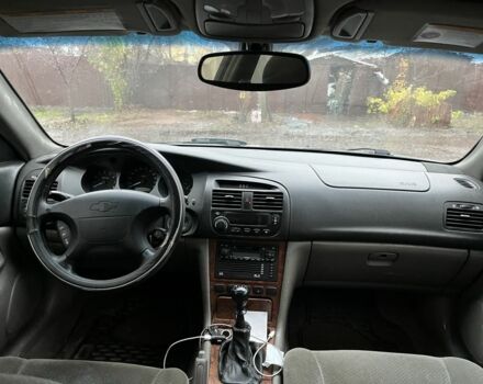 Сірий Шевроле Еванда, об'ємом двигуна 2 л та пробігом 300 тис. км за 3200 $, фото 11 на Automoto.ua