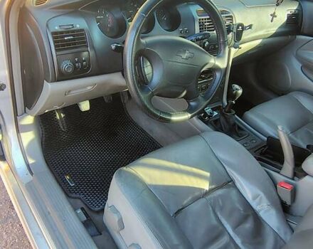 Сірий Шевроле Еванда, об'ємом двигуна 2 л та пробігом 330 тис. км за 3999 $, фото 7 на Automoto.ua