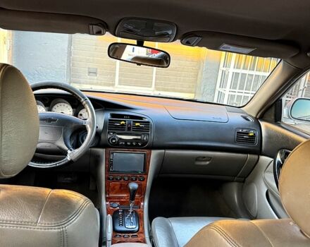 Серый Шевроле Эванда, объемом двигателя 2 л и пробегом 403 тыс. км за 3450 $, фото 12 на Automoto.ua