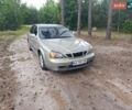 Серый Шевроле Эванда, объемом двигателя 2 л и пробегом 308 тыс. км за 2800 $, фото 1 на Automoto.ua