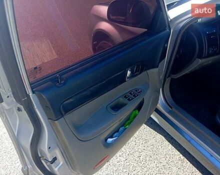 Сірий Шевроле Еванда, об'ємом двигуна 2 л та пробігом 288 тис. км за 3400 $, фото 6 на Automoto.ua