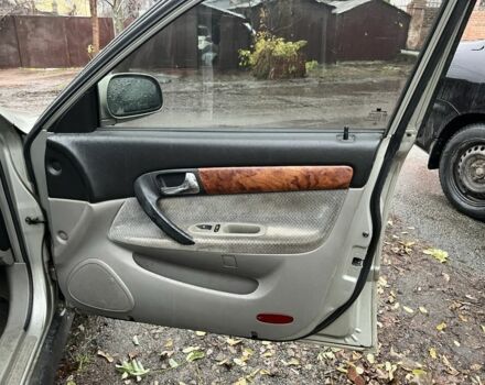 Сірий Шевроле Еванда, об'ємом двигуна 2 л та пробігом 300 тис. км за 3200 $, фото 9 на Automoto.ua