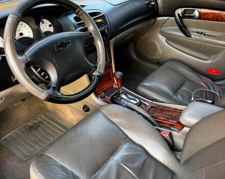 Серый Шевроле Эванда, объемом двигателя 2 л и пробегом 403 тыс. км за 3450 $, фото 10 на Automoto.ua