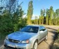 Сірий Шевроле Еванда, об'ємом двигуна 2 л та пробігом 340 тис. км за 3950 $, фото 1 на Automoto.ua