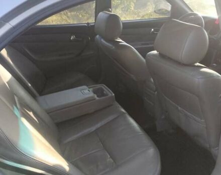 Серый Шевроле Эванда, объемом двигателя 2 л и пробегом 340 тыс. км за 3899 $, фото 18 на Automoto.ua