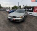 Сірий Шевроле Еванда, об'ємом двигуна 2 л та пробігом 208 тис. км за 4199 $, фото 1 на Automoto.ua