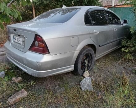 Серый Шевроле Эванда, объемом двигателя 2 л и пробегом 180 тыс. км за 1800 $, фото 2 на Automoto.ua