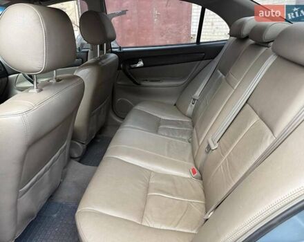 Сірий Шевроле Еванда, об'ємом двигуна 2 л та пробігом 173 тис. км за 3800 $, фото 8 на Automoto.ua