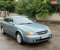 Сірий Шевроле Еванда, об'ємом двигуна 2 л та пробігом 190 тис. км за 3350 $, фото 1 на Automoto.ua