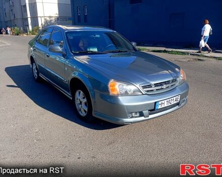 Серый Шевроле Эванда, объемом двигателя 2 л и пробегом 288 тыс. км за 3400 $, фото 3 на Automoto.ua