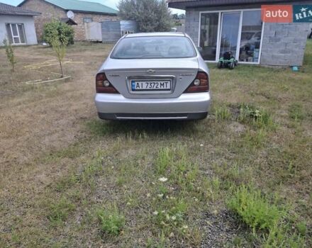 Сірий Шевроле Еванда, об'ємом двигуна 2.5 л та пробігом 240 тис. км за 3100 $, фото 24 на Automoto.ua