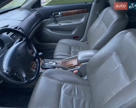 Серый Шевроле Эванда, объемом двигателя 2 л и пробегом 210 тыс. км за 3300 $, фото 9 на Automoto.ua