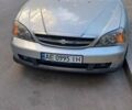 Серый Шевроле Эванда, объемом двигателя 2 л и пробегом 238 тыс. км за 3700 $, фото 1 на Automoto.ua