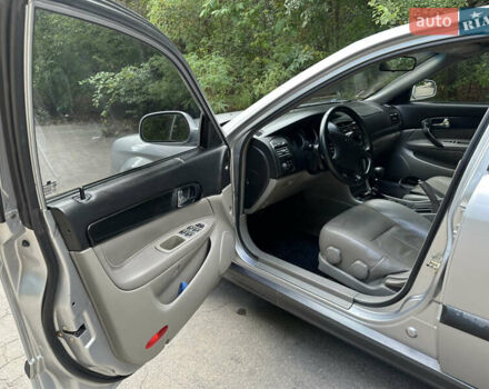 Сірий Шевроле Еванда, об'ємом двигуна 2 л та пробігом 163 тис. км за 3900 $, фото 8 на Automoto.ua