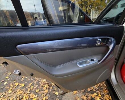 Серый Шевроле Эванда, объемом двигателя 2 л и пробегом 314 тыс. км за 3900 $, фото 10 на Automoto.ua