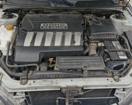 Сірий Шевроле Еванда, об'ємом двигуна 2.5 л та пробігом 103 тис. км за 5000 $, фото 10 на Automoto.ua