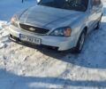Сірий Шевроле Еванда, об'ємом двигуна 2 л та пробігом 212 тис. км за 4700 $, фото 1 на Automoto.ua