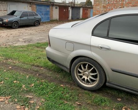 Серый Шевроле Эванда, объемом двигателя 2.5 л и пробегом 310 тыс. км за 2100 $, фото 7 на Automoto.ua