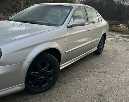 Серый Шевроле Эванда, объемом двигателя 2 л и пробегом 260 тыс. км за 3799 $, фото 2 на Automoto.ua