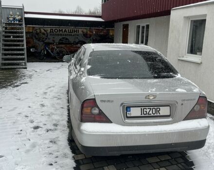 Серый Шевроле Эванда, объемом двигателя 2 л и пробегом 204 тыс. км за 3500 $, фото 1 на Automoto.ua