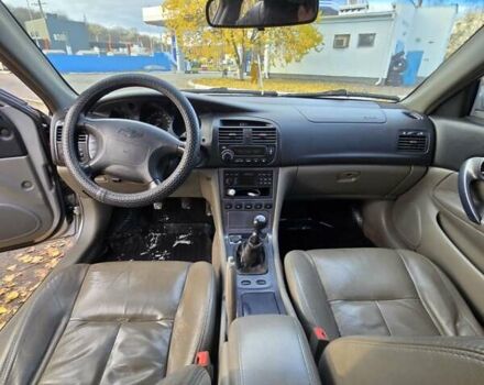 Серый Шевроле Эванда, объемом двигателя 2 л и пробегом 314 тыс. км за 3900 $, фото 13 на Automoto.ua