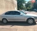 Сірий Шевроле Еванда, об'ємом двигуна 2 л та пробігом 190 тис. км за 3200 $, фото 1 на Automoto.ua