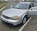 Сірий Шевроле Еванда, об'ємом двигуна 2.5 л та пробігом 103 тис. км за 5000 $, фото 1 на Automoto.ua