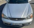 Сірий Шевроле Еванда, об'ємом двигуна 2.5 л та пробігом 160 тис. км за 5224 $, фото 1 на Automoto.ua