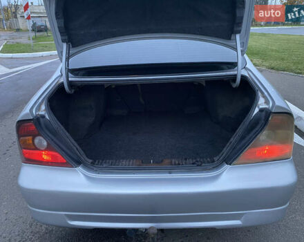 Серый Шевроле Эванда, объемом двигателя 2 л и пробегом 210 тыс. км за 3300 $, фото 11 на Automoto.ua