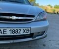 Сірий Шевроле Еванда, об'ємом двигуна 2.5 л та пробігом 283 тис. км за 4000 $, фото 13 на Automoto.ua