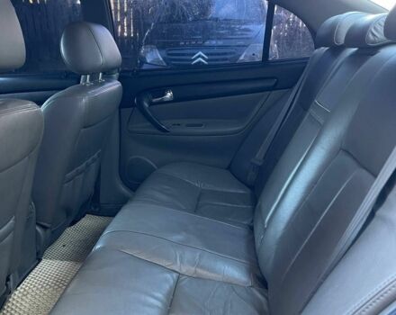 Серый Шевроле Эванда, объемом двигателя 2 л и пробегом 300 тыс. км за 2800 $, фото 15 на Automoto.ua