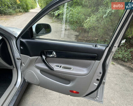 Сірий Шевроле Еванда, об'ємом двигуна 2 л та пробігом 163 тис. км за 3900 $, фото 13 на Automoto.ua